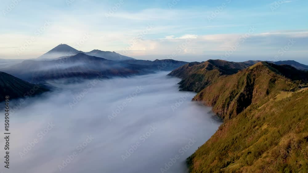 Aerial view of Mount Bromo, is an active volcano and part of the Tengger massif, in East Java, Indonesia. Discover the Magic of Bromo Tengger Semeru National Park Aerial view of Mount Bromo, is an active volcano and part of the Tengger massif, in East Java, Indonesia. Discover the Magic of Bromo Tengger Semeru National Park