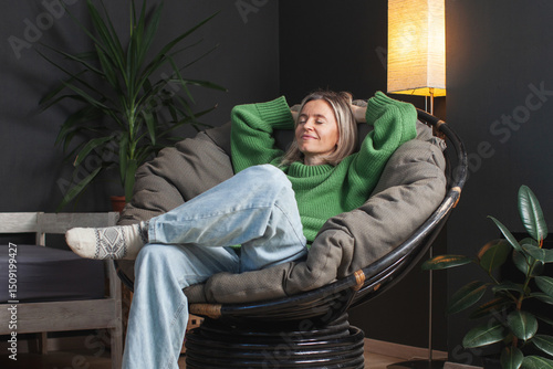 Happy middle aged Woman relaxing at home