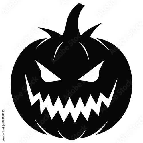 Spooky black silhouette of a carved jack o lantern pumpkin with evil expression
