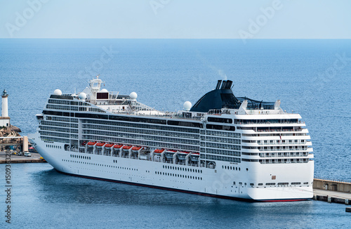 Obraz na plátně Modern Cruise Ship Docked at Port by the Sea