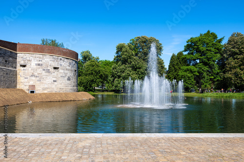 Fountain and Historic Building in a public park of Maastricht