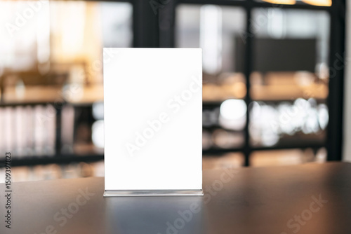 Blank menu frame on table in coffee shop stand for your text of display your product
