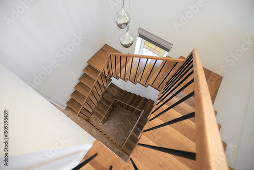 Wooden staircase in the interior of the house