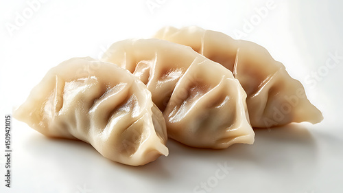 delicious steamed dumplings on a plate perfect for asian cuisine themes, juicy momo, appetizing steamed dumplings beautifully arranged on a plate, showcasing their delicate folds and smooth texture