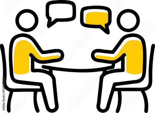 Two people sitting at a table talking business meeting discussion