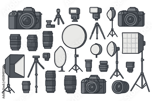 Equipment arranged for photography setup showcasing cameras, lenses, lights, and accessories in a creative workshop space