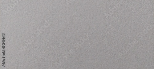 Textura gris clara de pared con acabado rugoso uniforme