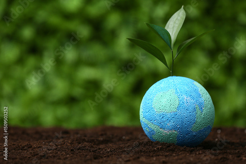 Model of Earth with plant s...