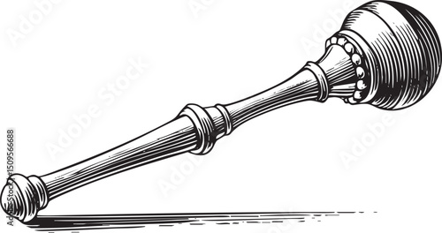 vintage gavel rests on a plain surface.