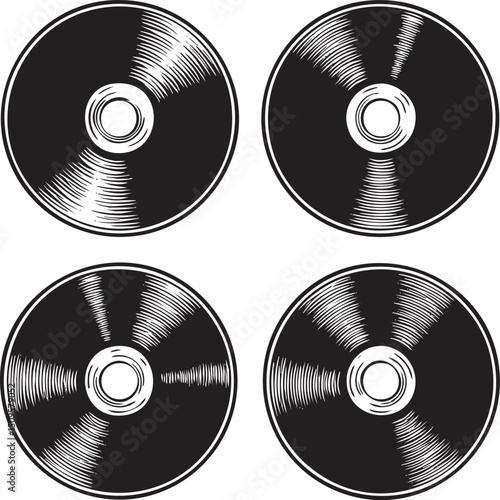 Four black circular discs display intricate radial .