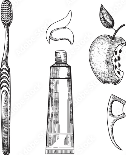 toothbrush rests alongside a toothpaste tube and an slice.