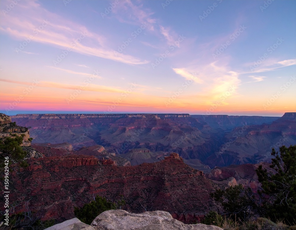 A sunrise sunset over a canyon. A sunrise sunset over a canyon.