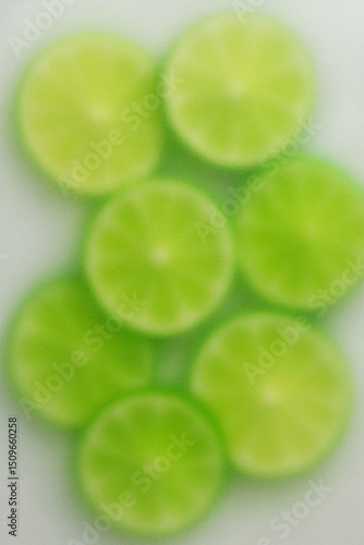 Lime Slices Under Frosted Glass Green Citrus Fruit Abstract Food Background
