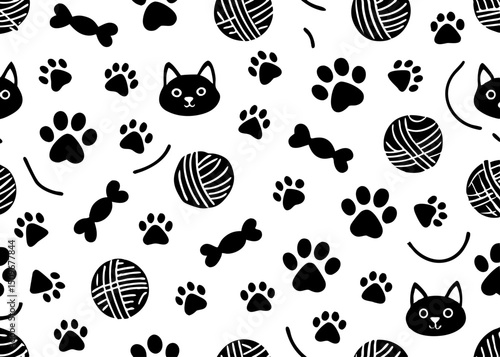 Whimsical black and white cat paw prints and toy pattern design element