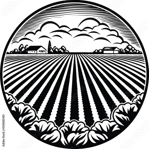 Panoramic farmland scene with plowed fields and bushes