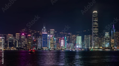 Wallpaper Mural Hong Kong 01.03.2025 Nighttime skyline view of Hong Kong showcasing illuminated skyscrapers, waterfront attractions, and vibrant city life. Aerial perspectives capture the dynamic urban lights and ref Torontodigital.ca