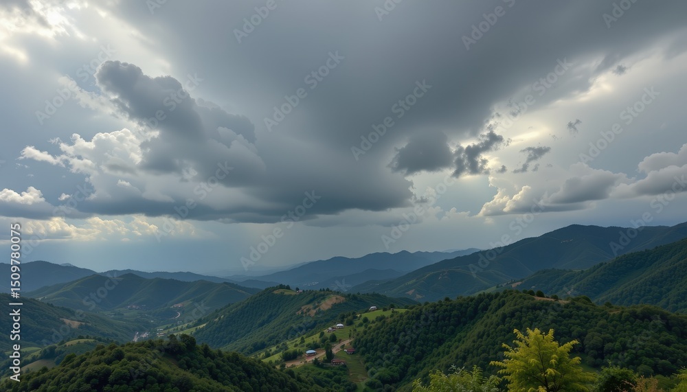 Obraz premium Panoramic green mountain landscape with summer clouds, forest, and sky view