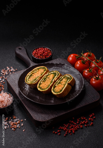 Roll of omelette, spinach, cheese and minced meat