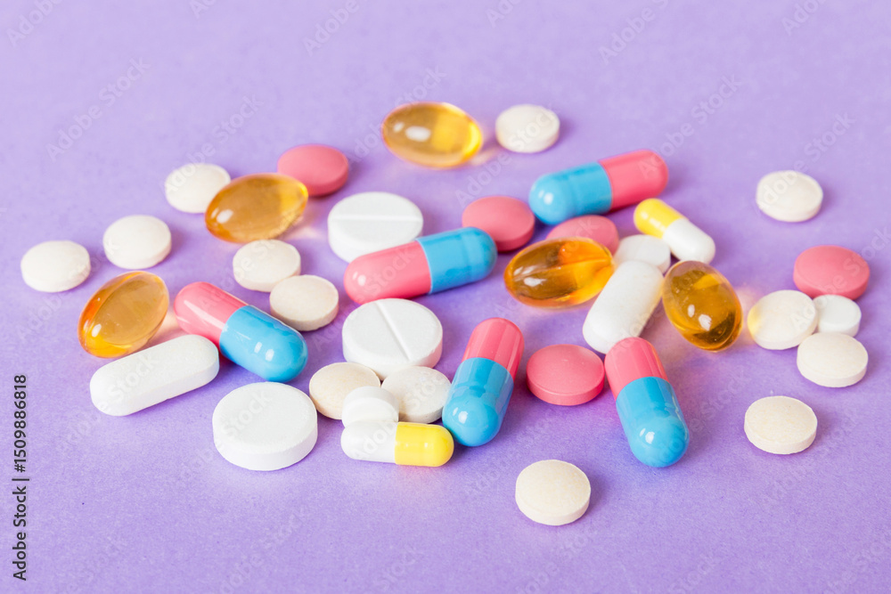 Many different colorful medication and pills perspective view. Set of many pills on colored background Many different colorful medication and pills perspective view. Set of many pills on colored background