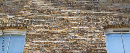 Photography Traditional London Brick Wall with Arched Windows