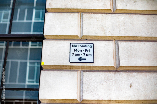 No Loading Sign on Building Wall in London