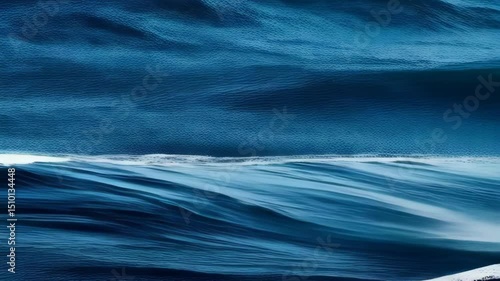 Dynamic ocean waves crashing and spraying with turquoise water, creating powerful and turbulent seascape imagery.