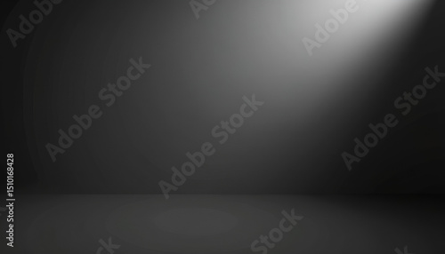 A single beam of light illuminates a dark, empty room, creating a moody and dramatic atmosphere.