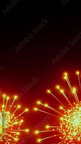 A black background with a few red dots scattered around. The dots are small and close together, creating a sense of unity and harmony. The image evokes a feeling of warmth and coziness