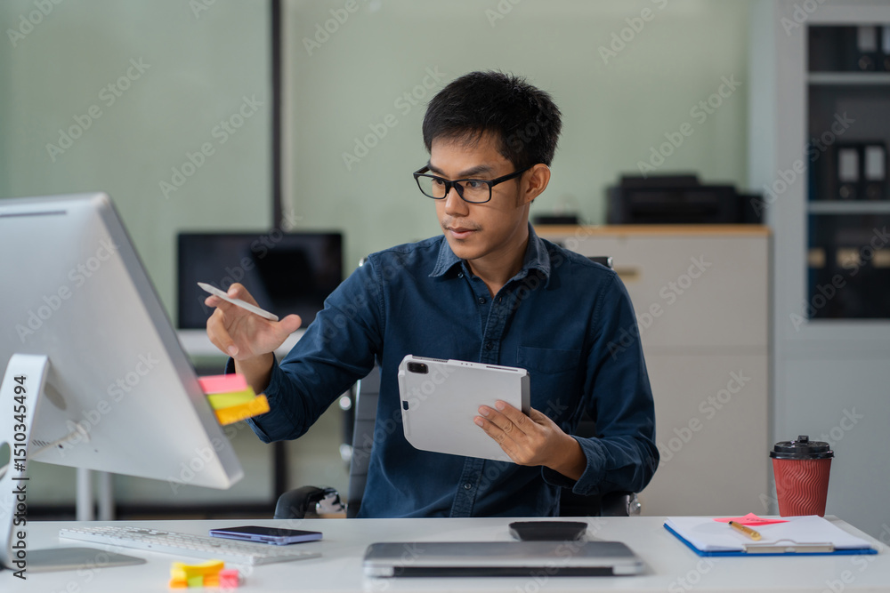 Male businessman are sitting searching for information in office.. Male businessman are sitting searching for information in office..