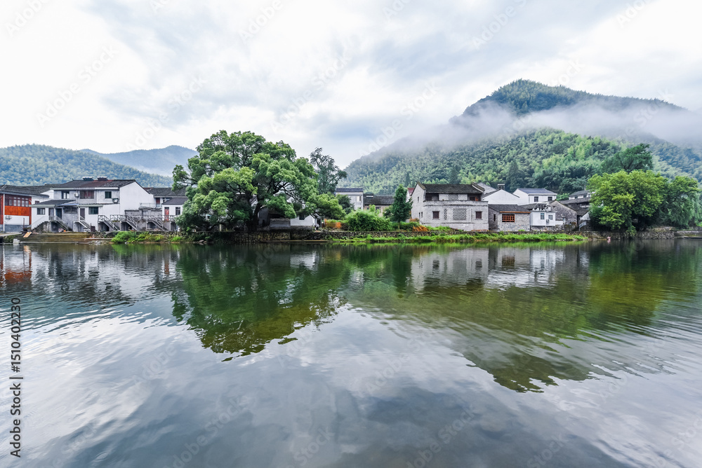 Rural Village Life Amid Verdant Green Hills and Tranquil Waterways Rural Village Life Amid Verdant Green Hills and Tranquil Waterways