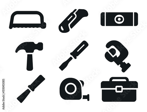 Construction Tools Icons. Solid, filled icons set of construction hand tools: hacksaw, utility knife, spirit