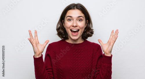 Woman hands raised celebration victory success achievement happiness joy excitement. Female red sweater enthusiastic gesture triumph concept