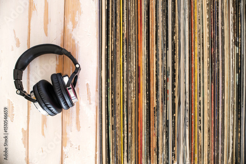 Classic vinyl records and headphones. Pure nostalgia in sound.