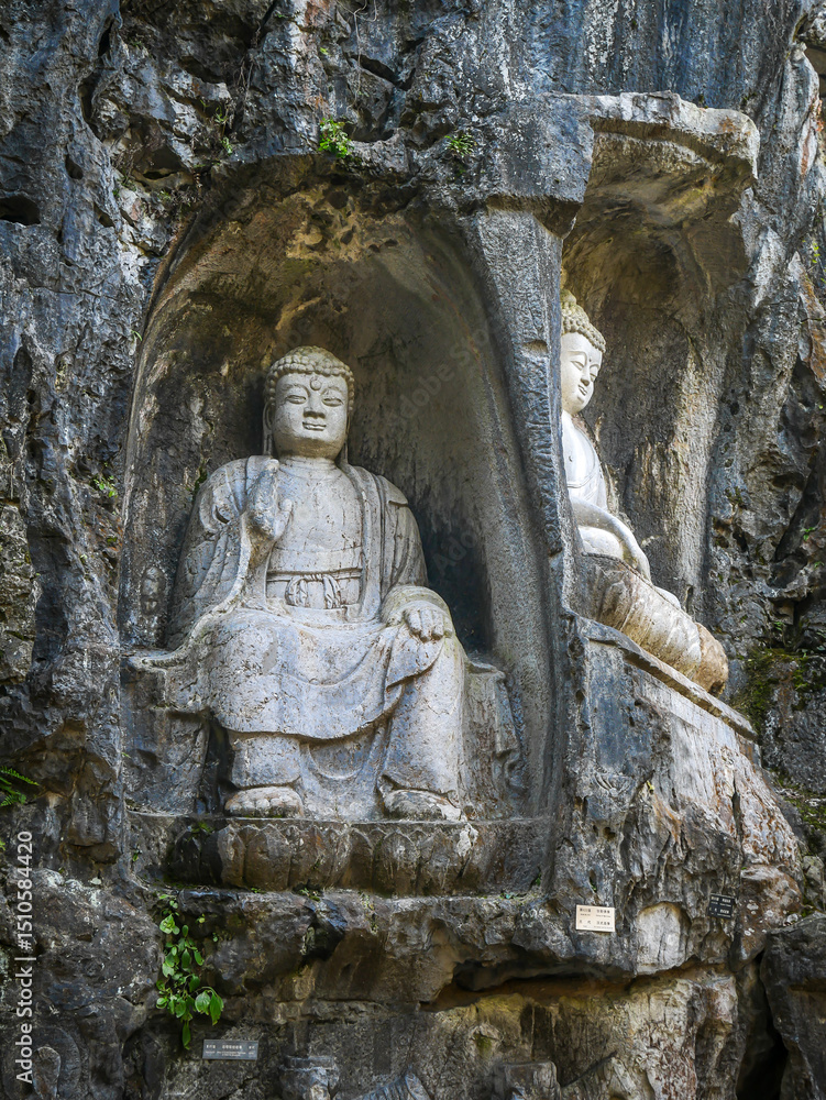 Obraz premium Rock caving scultors at Feilai Feng mountian in Lingyin Temple,One of the largest Buddhist temples in Hangzhou city of China