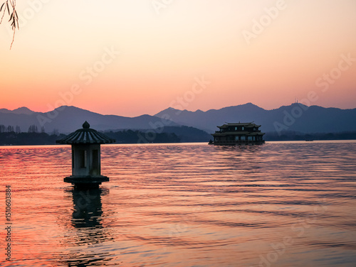Evening landscape of Sanpan pagoda at West lake(Xihu),located in Hangzhou city of China