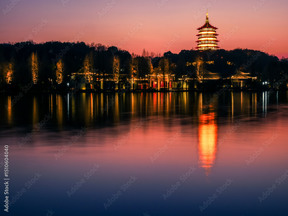 Fototapeta premium Night landscape of Leifeng pagoda,located at Xihu(west lake) at Hangzhou city,China