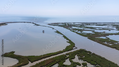 Porto Tolle is located between the Po di Maistra and Po di Gnocca rivers and is cut in half by the Po di Venezia (Parco regionale del Delta del Po)