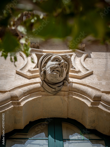 The nobleman head on Bertini Palace, in Ragusa, Sicily, Italy
