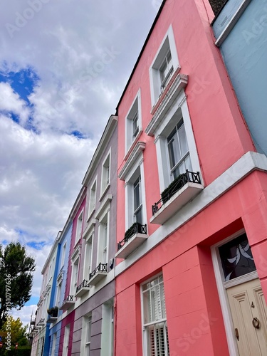 Pastel coloured buildings in Kentish Town near Hampstead, London, England, United Kingdom, Europe. An aesthetic photo capturing iconic European / English architecture in the heart of London City.