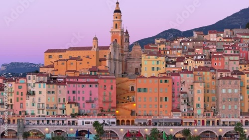 Coastal charm of Menton seen from above at sunrise, France. Aerial drone video
