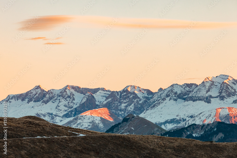Fototapeta premium View of the Pic du Midi d'Ossau, seen from the Pourtalet Pass, at sunset, during a clear winter evening, french Pyrenees mountains, France, Pyrenees-Atlantiques, Bearn, close to the spanish border