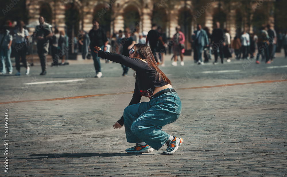 Fototapeta premium girl dancing in the square