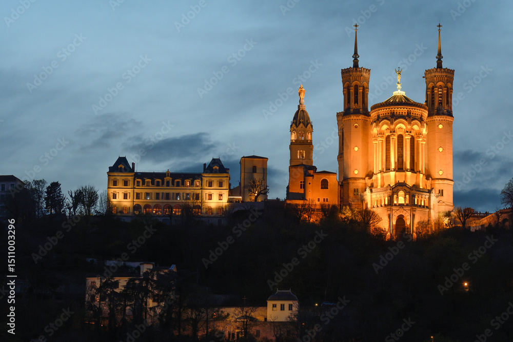 Panoramic view of Lyon at dusk, with the basilica in the background Panoramic view of Lyon at dusk, with the basilica in the background