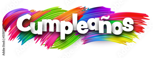 Spanish word meaning birthday in bold white letters over bright multicolor vector brush strokes