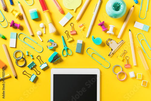 Back to school flat lay on yellow background