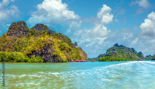 Billede på lærred Boat ride among stunning karst rock formations and mangrove forests, Langkawi UN