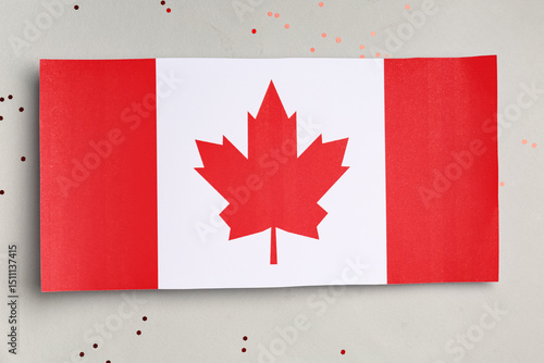 Paper flag of Canada with c...