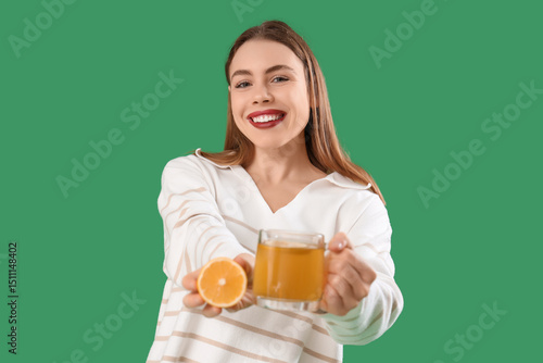 Young woman with lemon and ...