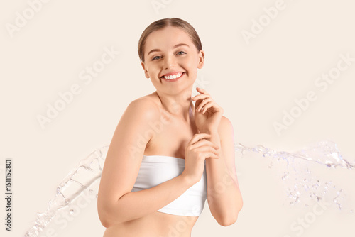 Happy young woman and splas...