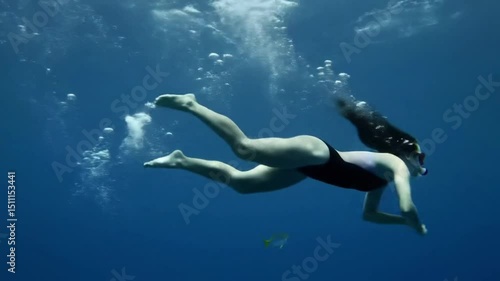 Wallpaper Mural Woman swimming underwater breathing Torontodigital.ca